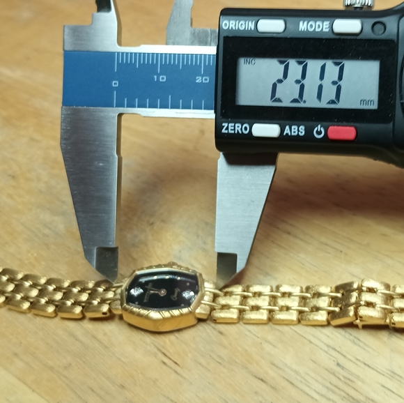 X Ladies gold plated watch, band black dial 2 hand movement diamond at 12 - Picture 4 of 9